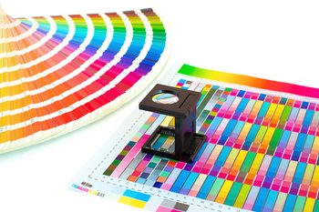 Pantone color book with printed color swatches